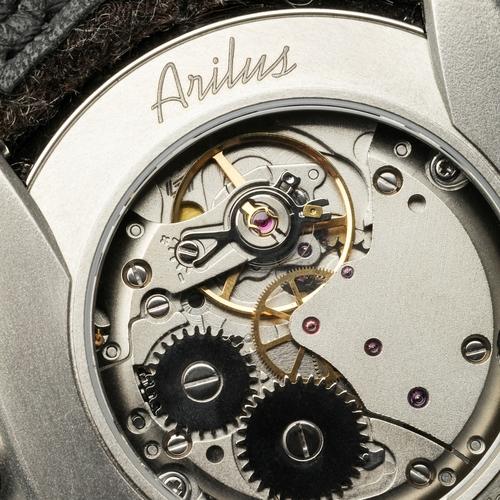 Photographe packshot annecy haute savoie montre dos mecanisme roue rouages detail precision grand arc photo 1